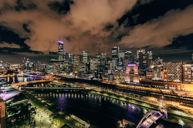 Melbourne skyline at night with clouds