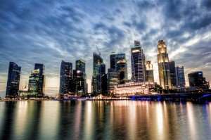 A colour picture of a Singapore business district at dusk.