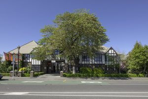 New Zealand Christchurch Heartland hotel Cotswold exterior sunny tree countryside