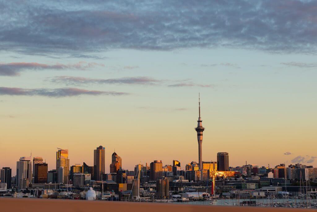 Auckland skyline at sunset with Sky Tower