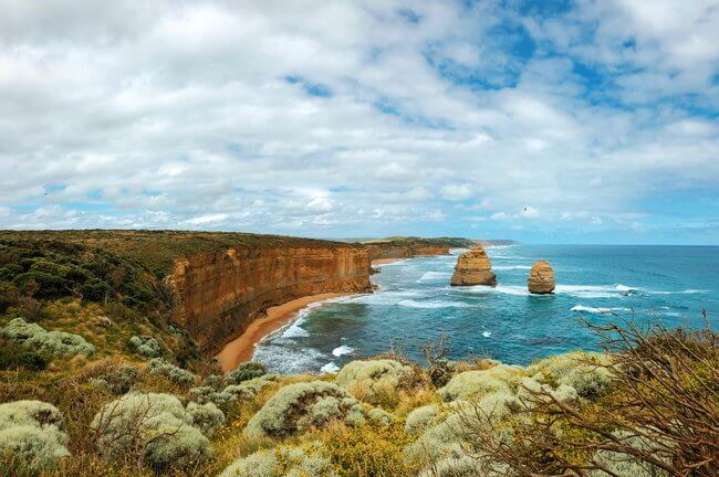 coastal view great ocean road blue skies clouds