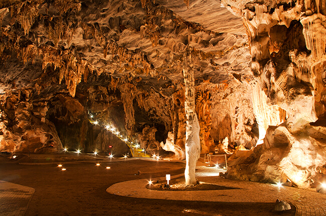 Stalagmites and Stalactites lit up within the Cango Caves