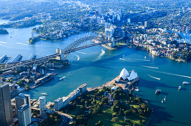 Sydney Harbour from above, green park with boats in harbour, Sydney Harbour Bridge