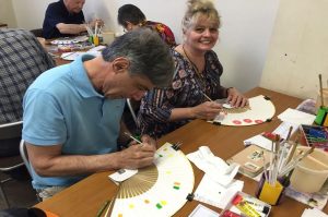 couple in japanese fan making class