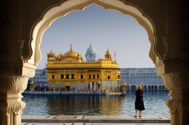 Golden Temple in Amritsar framed through archway