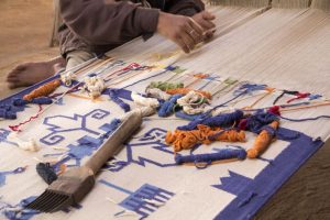 textile artist weaving cotton and embroidery in Udaipur India