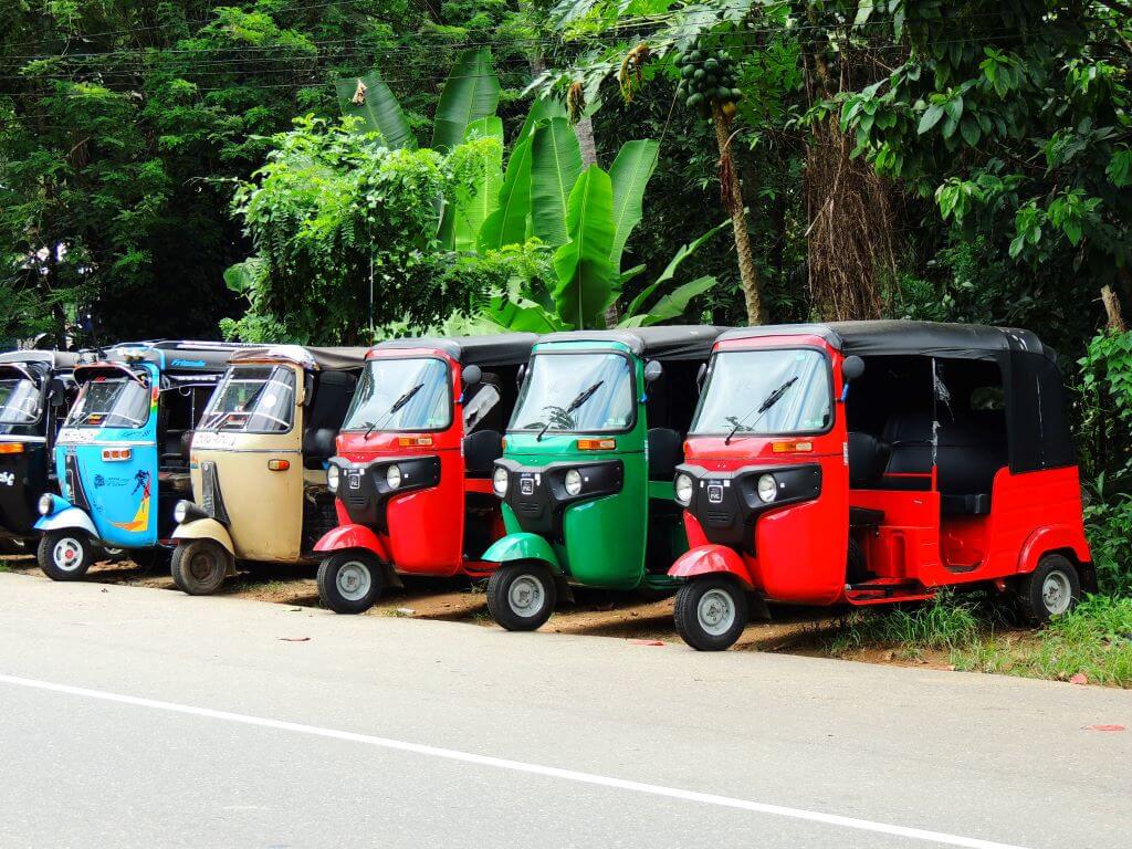 multicoloured Tuk Tuks lined up for safari in Galle Sri Lanka