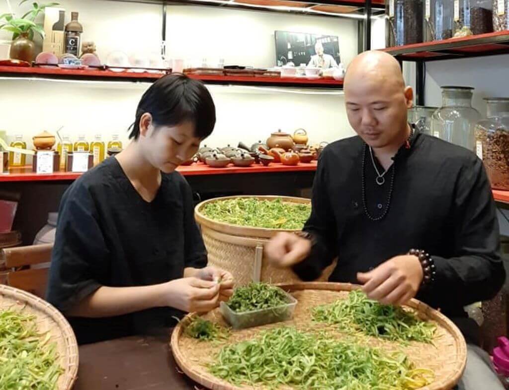 Tea master making tea from leaves in Hanoi Vietnam