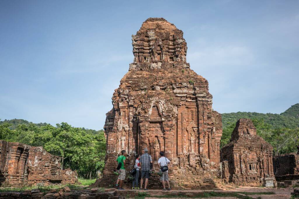People in front of My Son temples in Hoi-An Vietnam