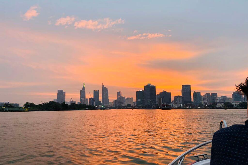 Ho Chi Minh City at sunset taken from boat on the river
