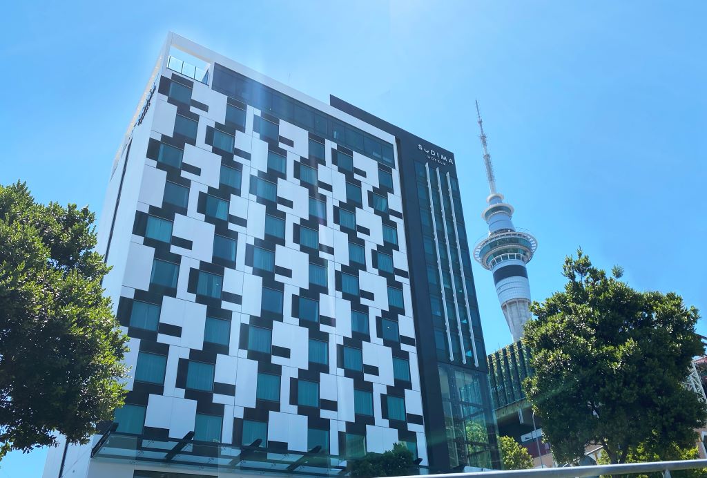 Sudima Auckland City exterior with Sky Tower
