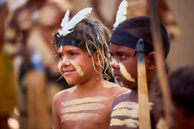 Aboriginal children with traditional paint and headdress