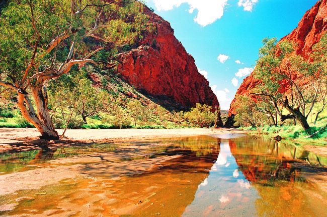 Simpsons Gap in Western Macdonnell ranges with reflection of gap in the water