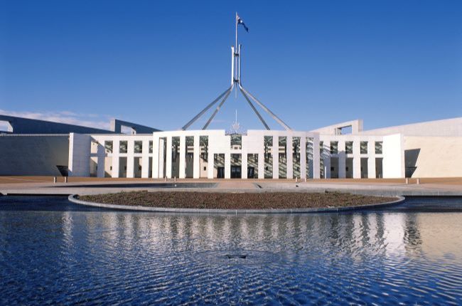 Parliament House Canberra with bright blue sky