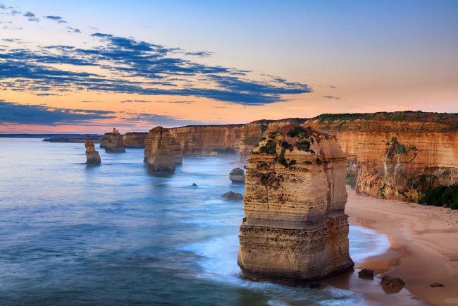 12 Apostles on Great Ocean Road with view along coastline and cliffs