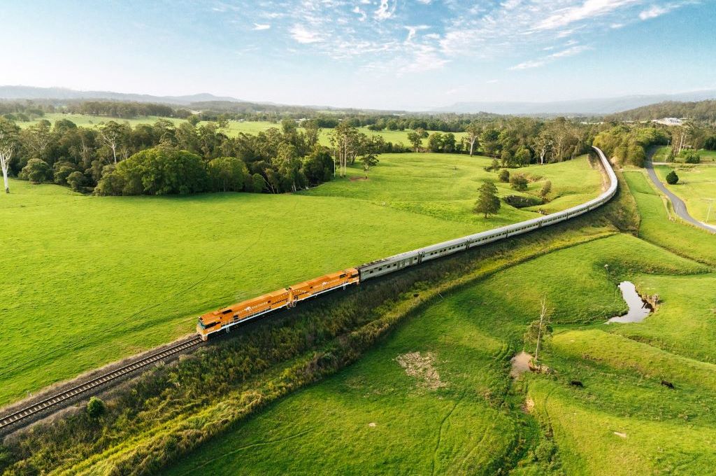 Great Southern snaking through the countryside with fields and trees in the background