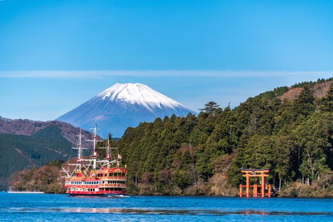Tourist Pirate Boat cruising beautiful Lake Ashi with Mount Fuji in the background