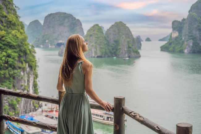 Woman looking out over Ha Long Bay