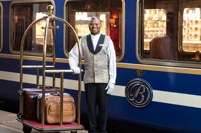 Bagage Porter outside of the Blue Train