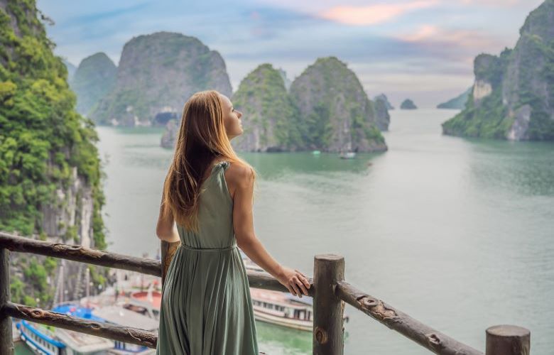 Woman looking out over Ha Long Bay in Vietnam