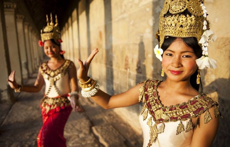 Two Cambodian ladies wearing traditional Apsara costume