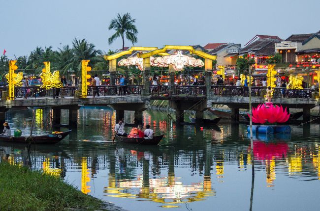Vietnamese river with local markets in the evening