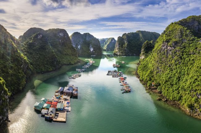 Aerial view of Cua Van floating fishing village and Rock Island Halong Bay Vietnam