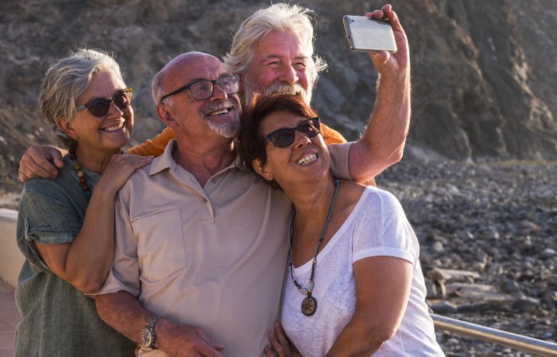 Group of friends on holiday taking a photo